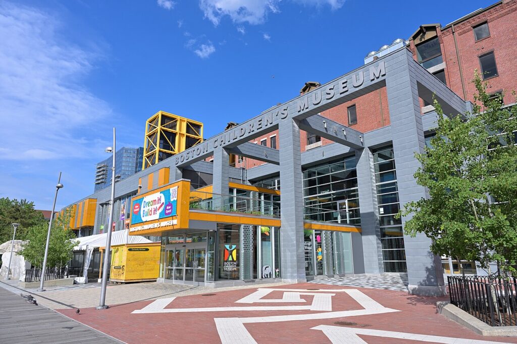 Front entrance of the Boston Children's Museum in Fort Point under a bright blue sky