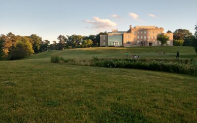 The McMullen Museum of Art and its sloping green lawn on Boston College's Brighton Campus at golden hour