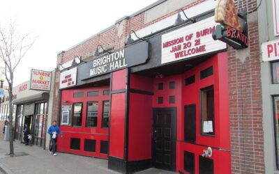 Red-and-black storefront facade and marquee of Brighton Music Hall on Brighton Avenue in Allston